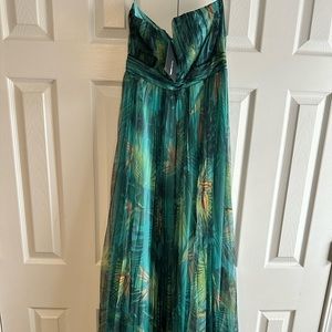 Beautiful ball gown with split. New with tags.